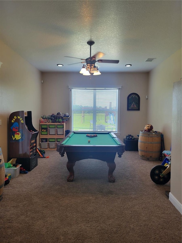 rec room with ceiling fan, billiards, carpet flooring, and a textured ceiling