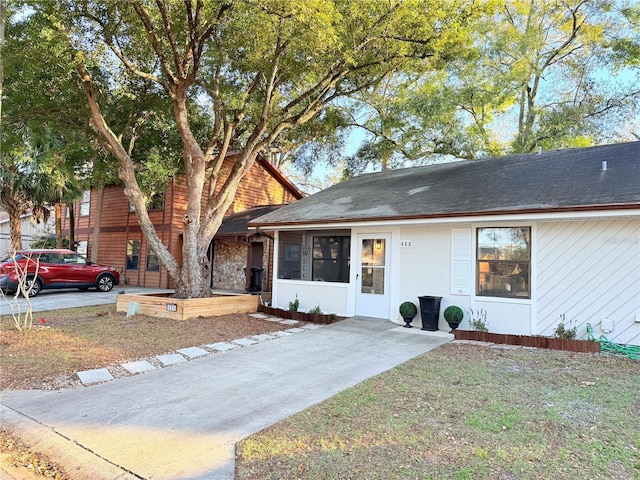 view of front of property with a front lawn