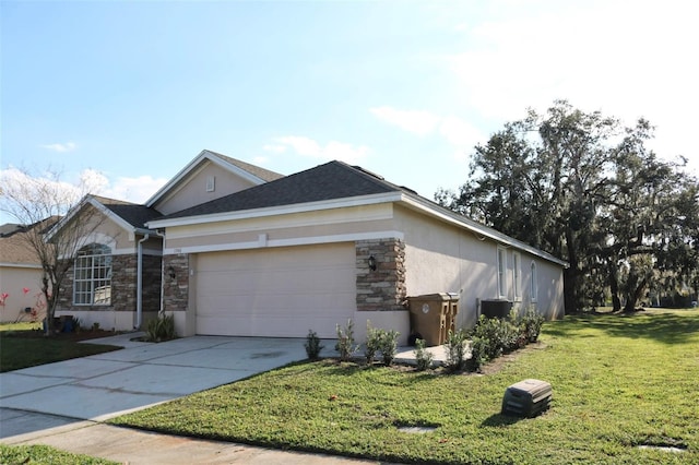 view of front facade featuring a garage and a front lawn