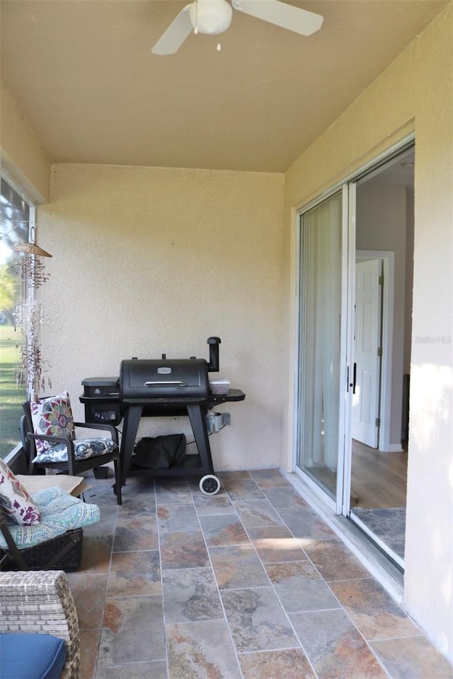 view of patio / terrace with ceiling fan