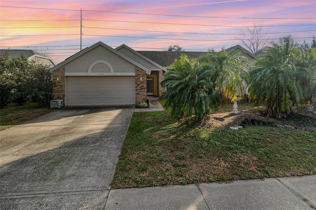 view of front of property with a garage