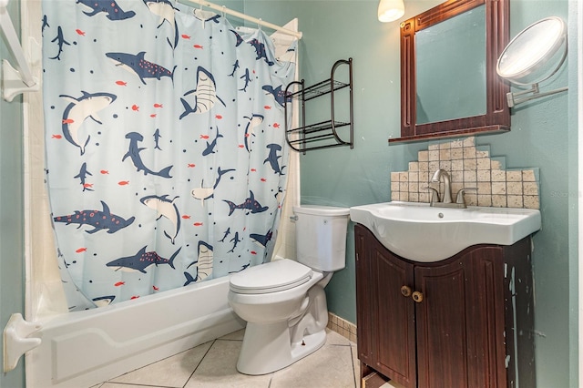 full bathroom featuring shower / tub combo with curtain, tasteful backsplash, tile patterned flooring, vanity, and toilet