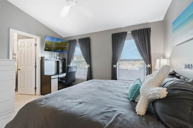 bedroom featuring ceiling fan and vaulted ceiling