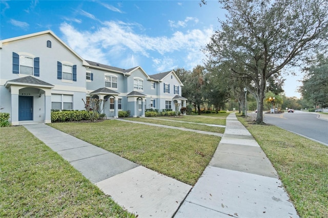 view of front of home with a front yard