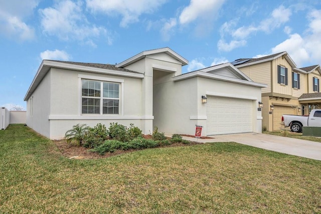 view of front of house with a garage and a front lawn