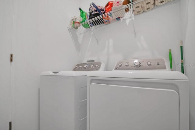 laundry room featuring independent washer and dryer