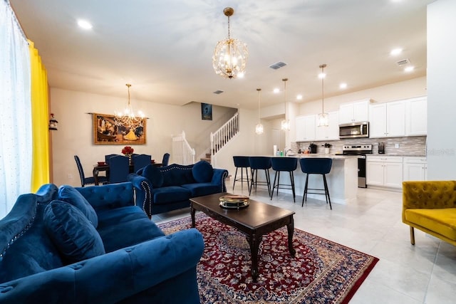 living room with an inviting chandelier