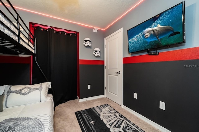 carpeted bedroom with a textured ceiling