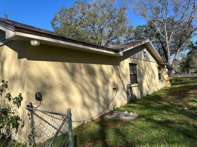 view of home's exterior featuring a yard