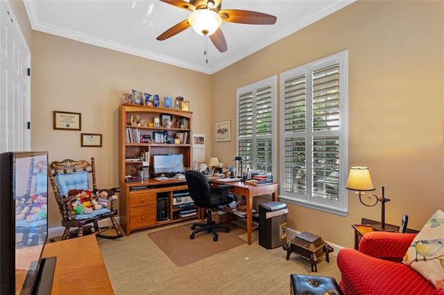 carpeted office space featuring ceiling fan and ornamental molding