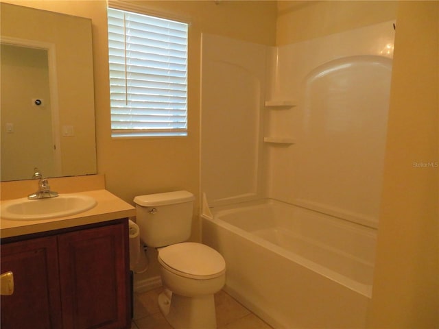 full bathroom featuring vanity, toilet, tile patterned flooring, and shower / bathing tub combination