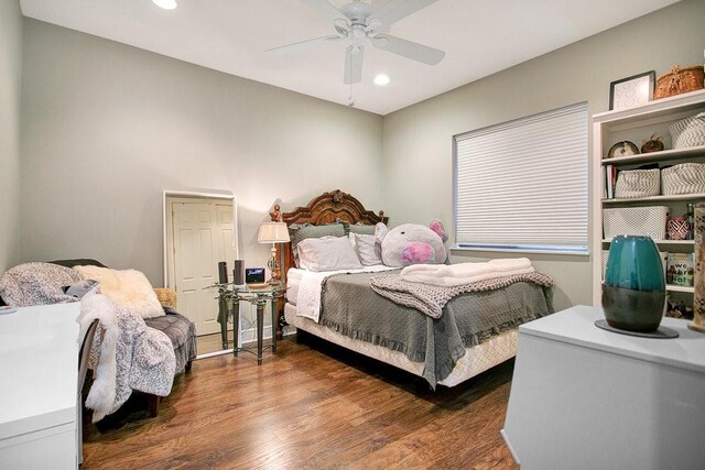 bedroom featuring dark wood finished floors, a ceiling fan, and recessed lighting