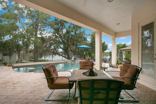 exterior space with a fenced in pool and a fenced backyard