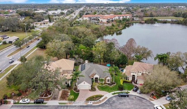 aerial view with a water view and a residential view