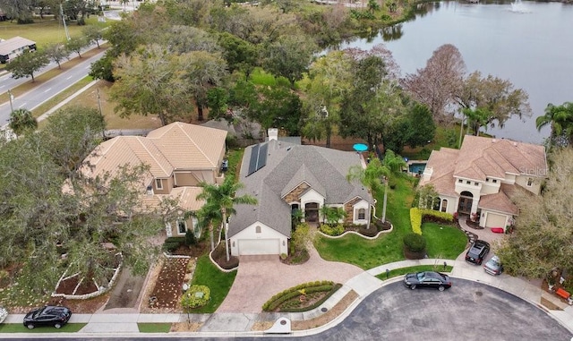 drone / aerial view featuring a water view