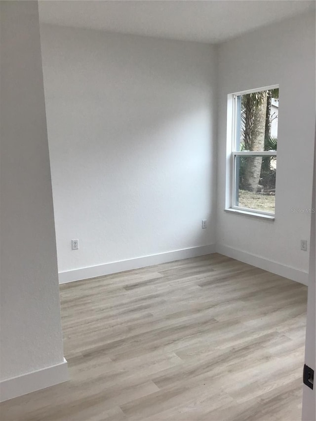 empty room featuring light hardwood / wood-style floors