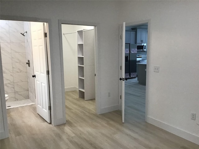 hall featuring light hardwood / wood-style floors