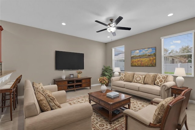 living room with ceiling fan