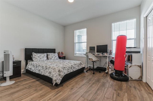 bedroom featuring hardwood / wood-style floors