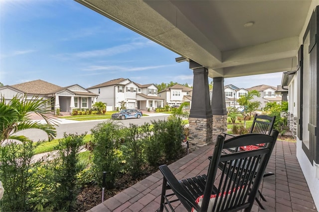 view of patio featuring covered porch