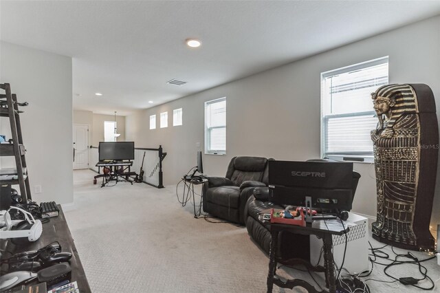 living room featuring light colored carpet