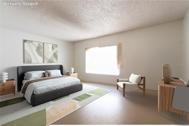 bedroom featuring a textured ceiling