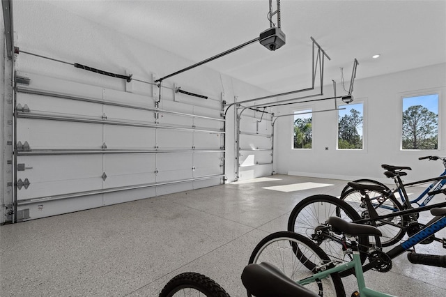 garage featuring a garage door opener