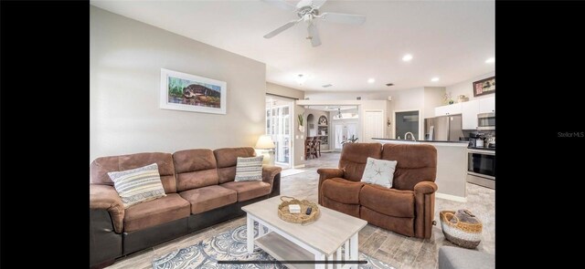 living room with ceiling fan