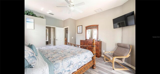 bedroom with ceiling fan and light hardwood / wood-style floors