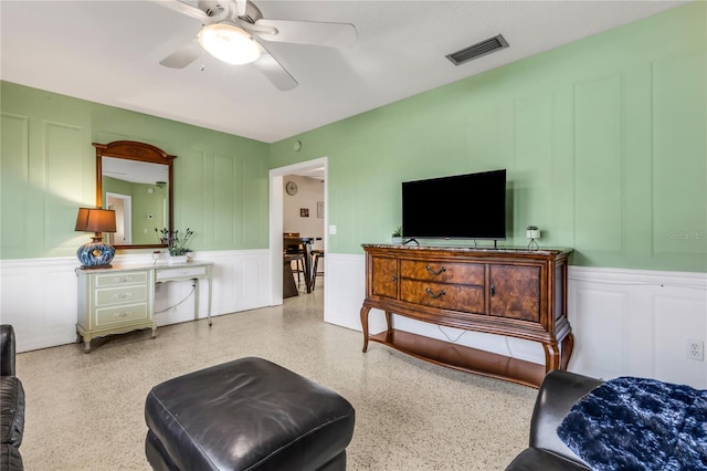 living room featuring ceiling fan