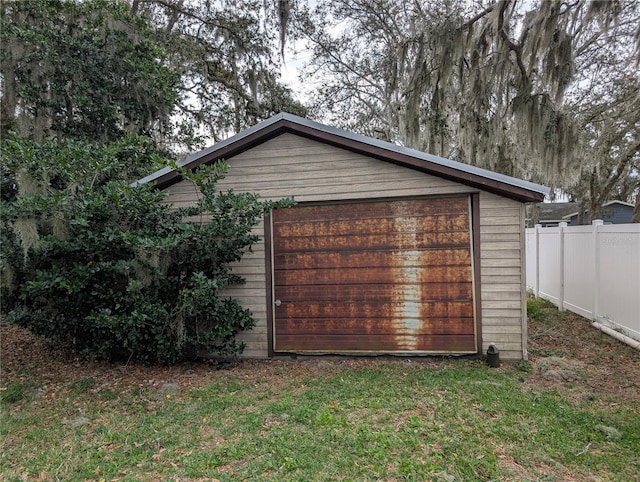 detached garage with fence