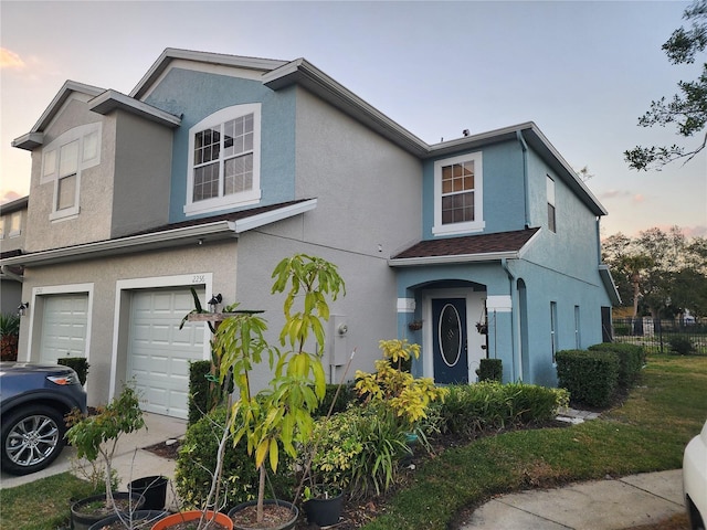 view of property with a garage