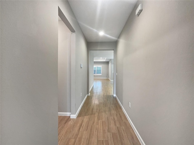 hallway featuring light wood-type flooring