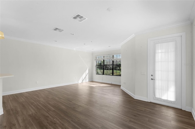 interior space with dark hardwood / wood-style flooring and crown molding