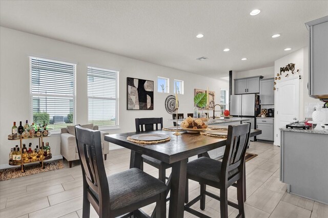 dining space with sink