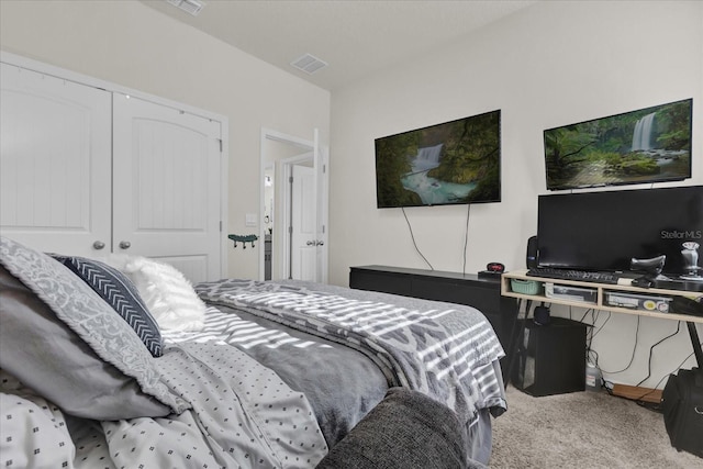 bedroom featuring carpet and a closet