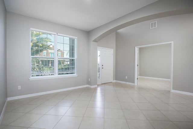 15165 Heron Hideaway Cir, Winter Garden, FL 34787 - unfurnished room featuring light tile patterned floors and a wealth of natural light