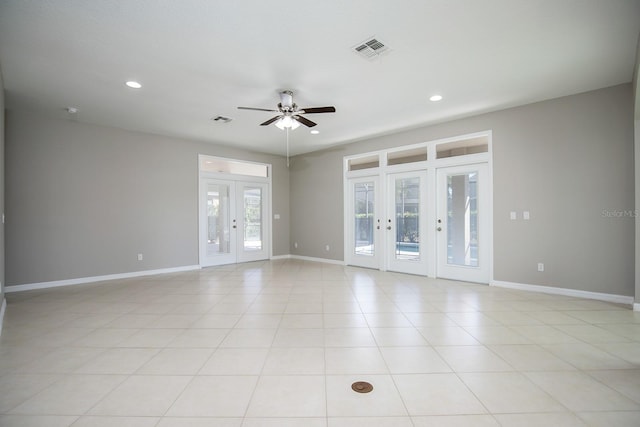 15165 Heron Hideaway Cir, Winter Garden, FL 34787 - unfurnished room with french doors, ceiling fan, and light tile patterned floors