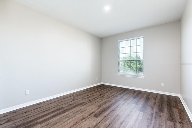 15165 Heron Hideaway Cir, Winter Garden, FL 34787 - unfurnished room featuring dark hardwood / wood-style floors