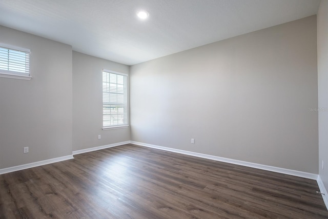 15165 Heron Hideaway Cir, Winter Garden, FL 34787 - unfurnished room featuring dark hardwood / wood-style flooring