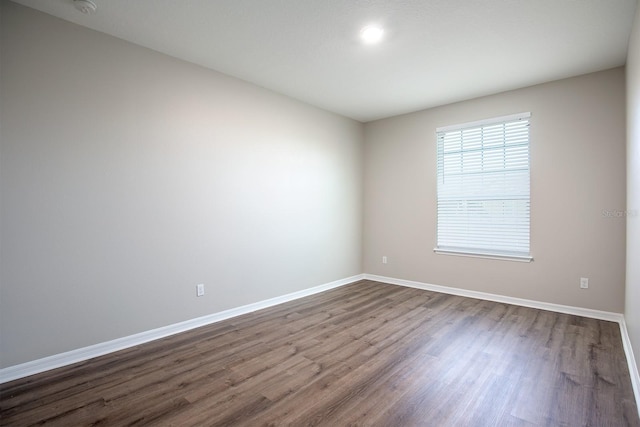 15165 Heron Hideaway Cir, Winter Garden, FL 34787 - spare room featuring wood-type flooring