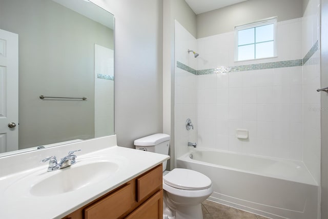 15165 Heron Hideaway Cir, Winter Garden, FL 34787 - full bathroom featuring tiled shower / bath, vanity, toilet, and tile patterned flooring