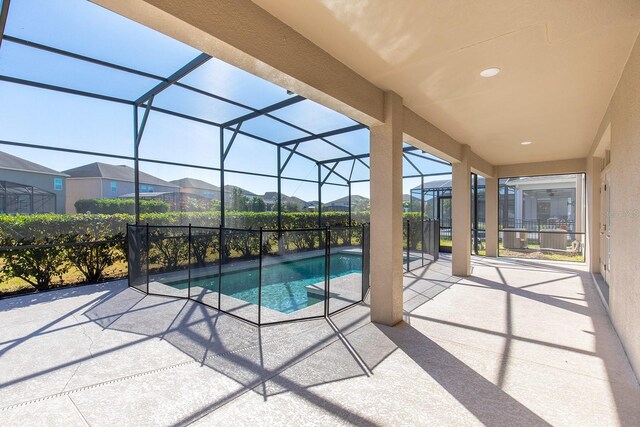 15165 Heron Hideaway Cir, Winter Garden, FL 34787 - view of pool featuring a lanai and a patio area