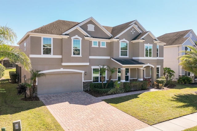 15165 Heron Hideaway Cir, Winter Garden, FL 34787 - view of front facade featuring a garage and a front lawn