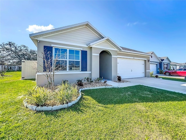 ranch-style home with a garage and a front yard