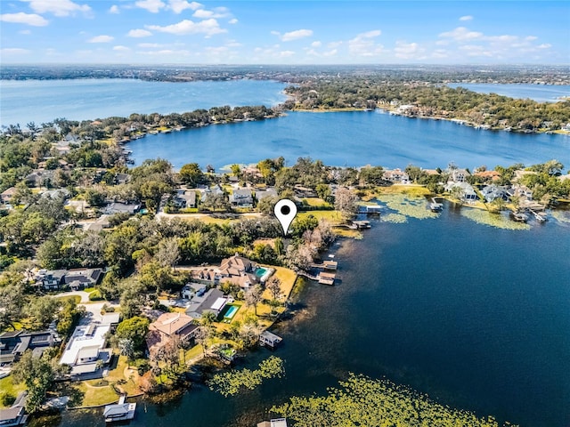 birds eye view of property featuring a water view