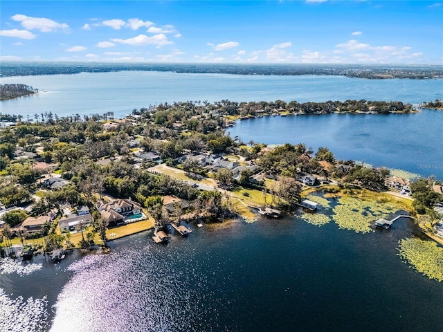 drone / aerial view with a water view