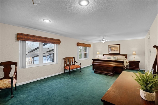 carpeted bedroom featuring a textured ceiling