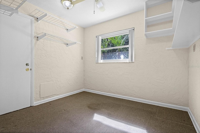 interior space featuring ceiling fan