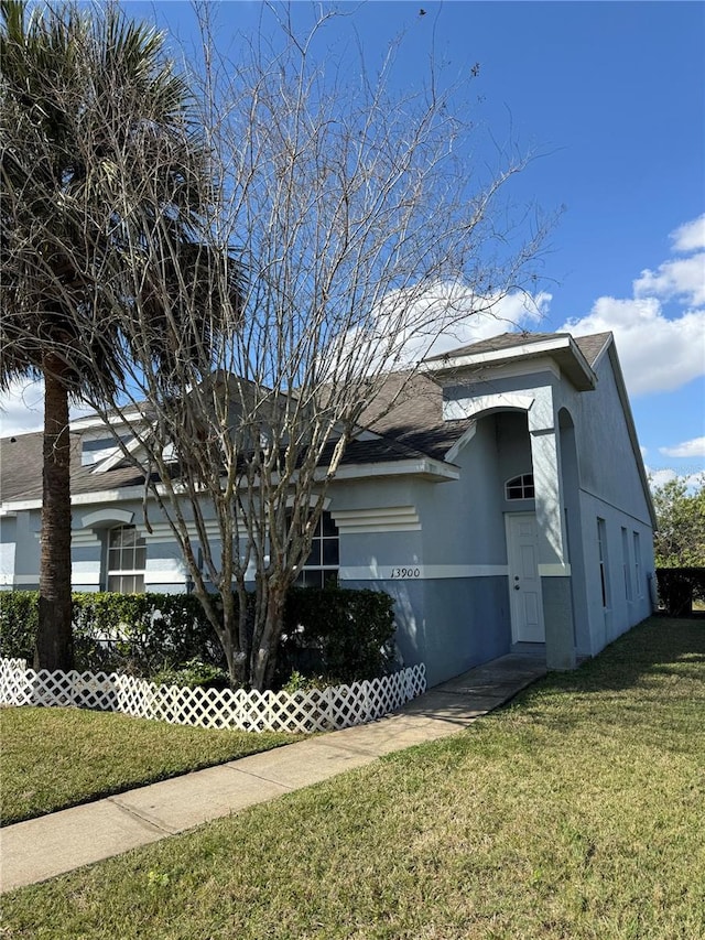 view of front of home with a front yard